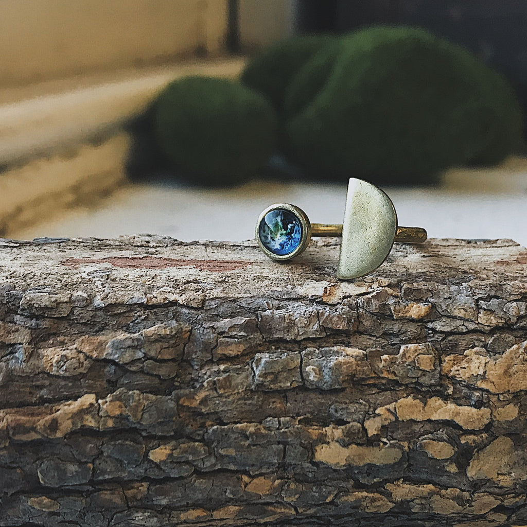 Earth Rise Ring inspired by the iconic view of Earth from space | Celestial ring with Earth gemstone for space lovers and dreamers | Planet Earth jewelry featuring a cosmic galaxy-style design | Unique galaxy ring capturing the magic of Earthrise from the Moon | Space-themed Earth ring with vibrant planetary detail and dark cosmic band | Astronomy-inspired jewelry perfect for stargazers and celestial dreamers | Cosmic statement ring symbolizing Earth's beauty and connection to the universe | Earth from spac