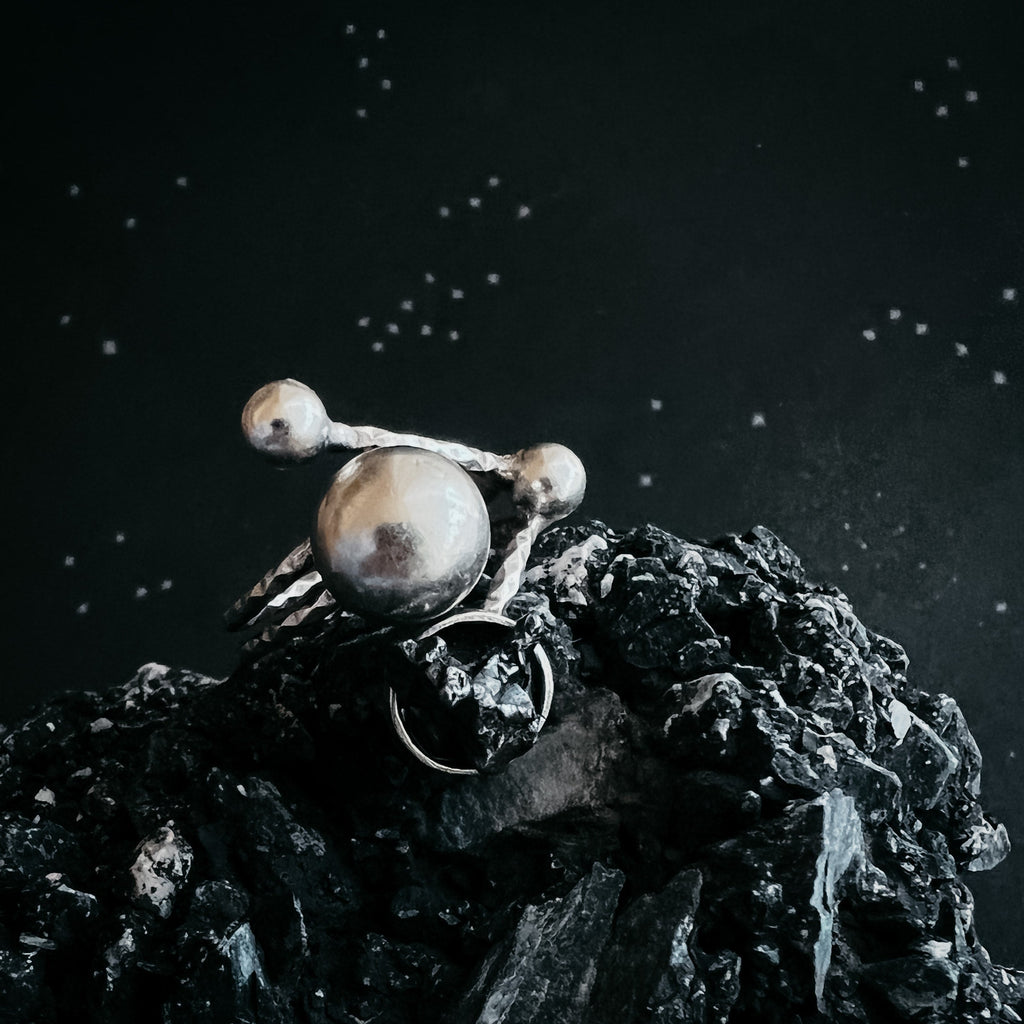 Celestial Orbital Style | CLEARANCE Cosmic Ring Crafted with Genuine Meteorite Fragment | Space Jewelry Ring with Orbit Motif and Authentic Meteorite | Unique Meteorite Ring for Astronomy and Science Enthusiasts | Celestial Orbit Ring with Real Meteorite from Outer Space | Statement Ring with Meteorite and Cosmic Motion Design | Orbiting Cosmic Bodies Ring with Rare Meteorite Stone | Meteorite Jewelry Gift for Space, Planet, and Star Lovers | Genuine Space Rock Ring in a Stylish Orbit-Inspired Setting