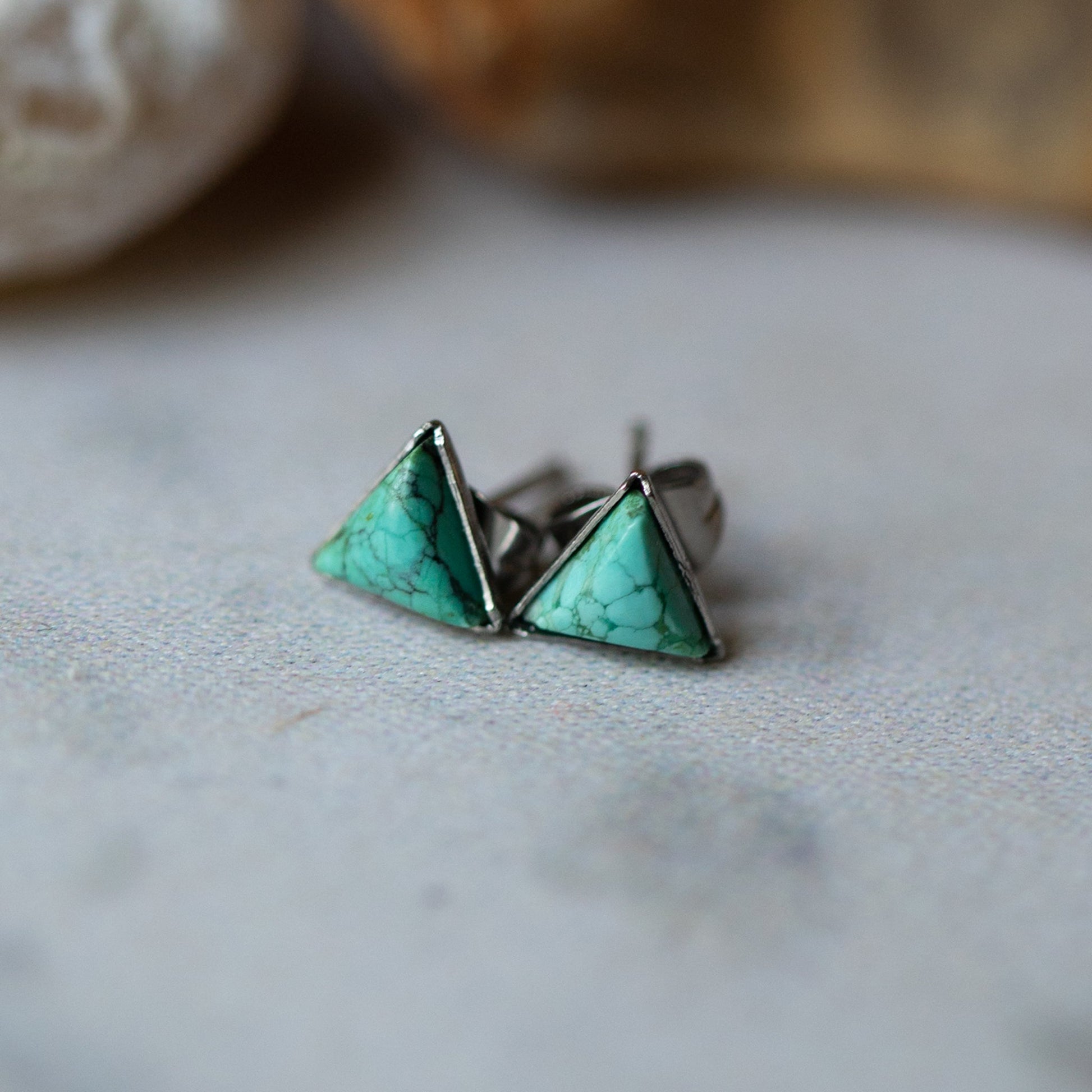Tiny Triangle Turquoise Stud Earrings Inspired by Mountains | Geometric Turquoise Earrings for Earth Lovers | Minimalist Triangle Earrings with Natural Turquoise Stone | Mountain-Inspired Tiny Turquoise Studs for Everyday Wear | Earthy Turquoise Earrings in a Dainty Triangle Shape | Nature-Themed Triangle Studs with Real Turquoise | Boho Chic Turquoise Triangle Earrings for Minimalist Style | Genuine Turquoise Stud Earrings with Mountain Symbolism | Triangle Turquoise Studs for Nature and Earth Sign Jewelry